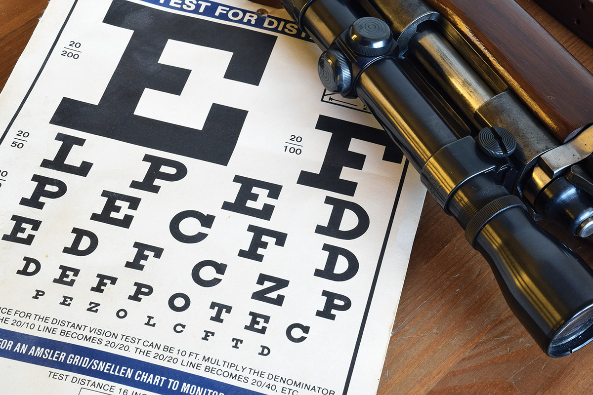 Wayne used an eye-exam chart to assess brightness and resolution in tests of old-versus-current scopes.